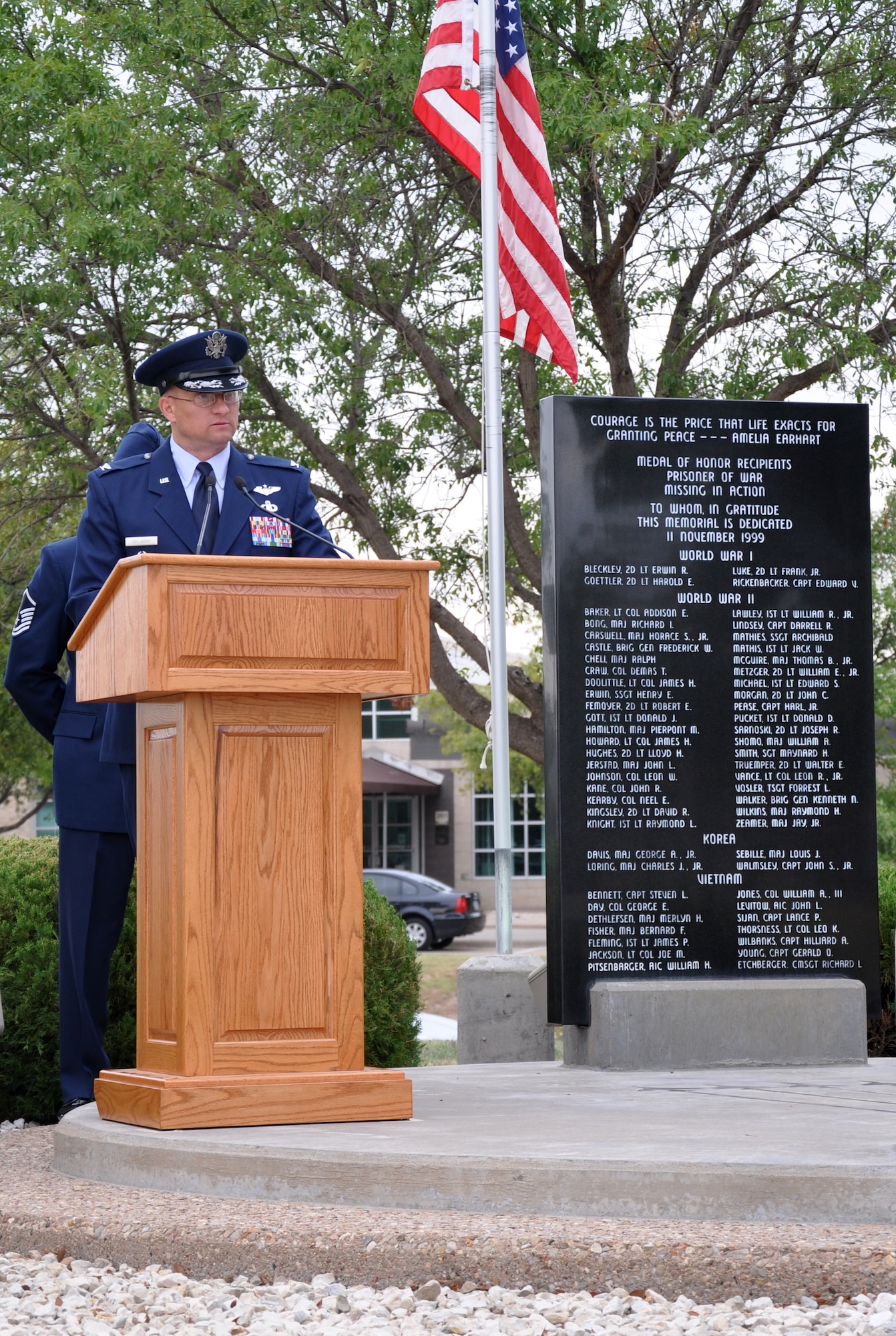 GOODFELLOW AIR FORCE BASE, Texas -- Col. William Golladay, 17th Training Wing Vice Commander, speaks to the crowd gathered at the Medal of Honor/POW/MIA Memorial here about the cost service members and their family continue to pay for freedom during the wing's POW/MIA Recognition Day Vigil Sept. (U.S. Air Force photo/Connie Hempel)