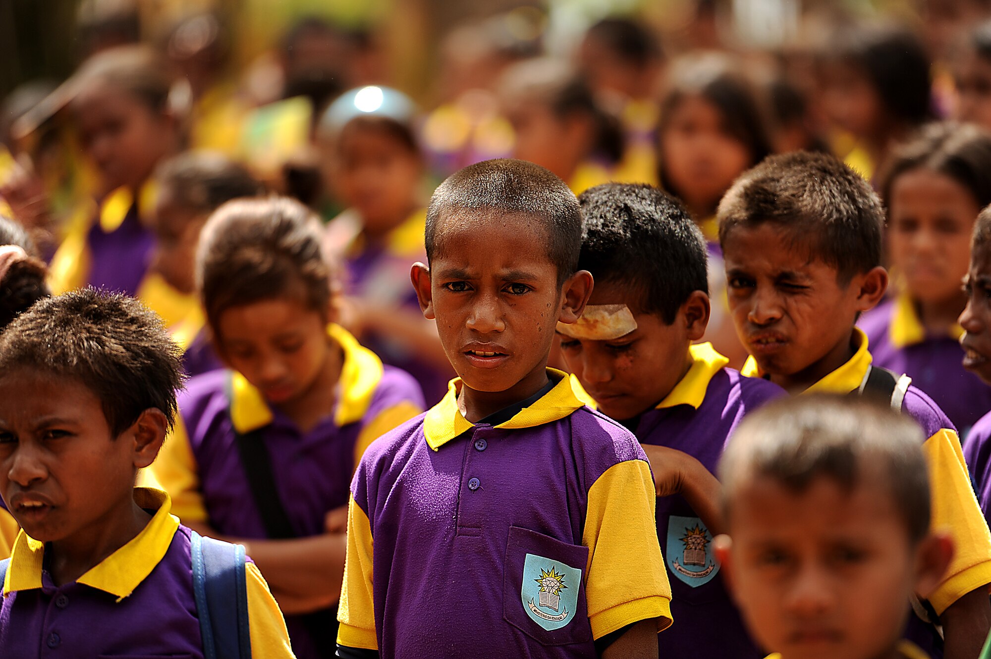 Baucau, Timor-Leste ? Children from the Tri-Loca Primary school in Triloca Village, Timore-Leste are released from school for the day 16 sept., 2011.

The Falintil For?as de Defesa de Timor-Leste, U.S. Air Force and Australian International Stabilization Forces are conducting PACIFIC ANGEL 11-02: Timor-Leste, a joint humanitarian and civic-military operation at the childrens school.
PACIFIC ANGEL consists of several concurrent civil-military assistance activities including medical programs consisting of: dental, optometry, women?s health, general medicine, engineering programs and subject matter expert exchanges in public health education and veterinary education. (U.S. Air Force Photo by: MSgt Jeremy Lock) (Released)
