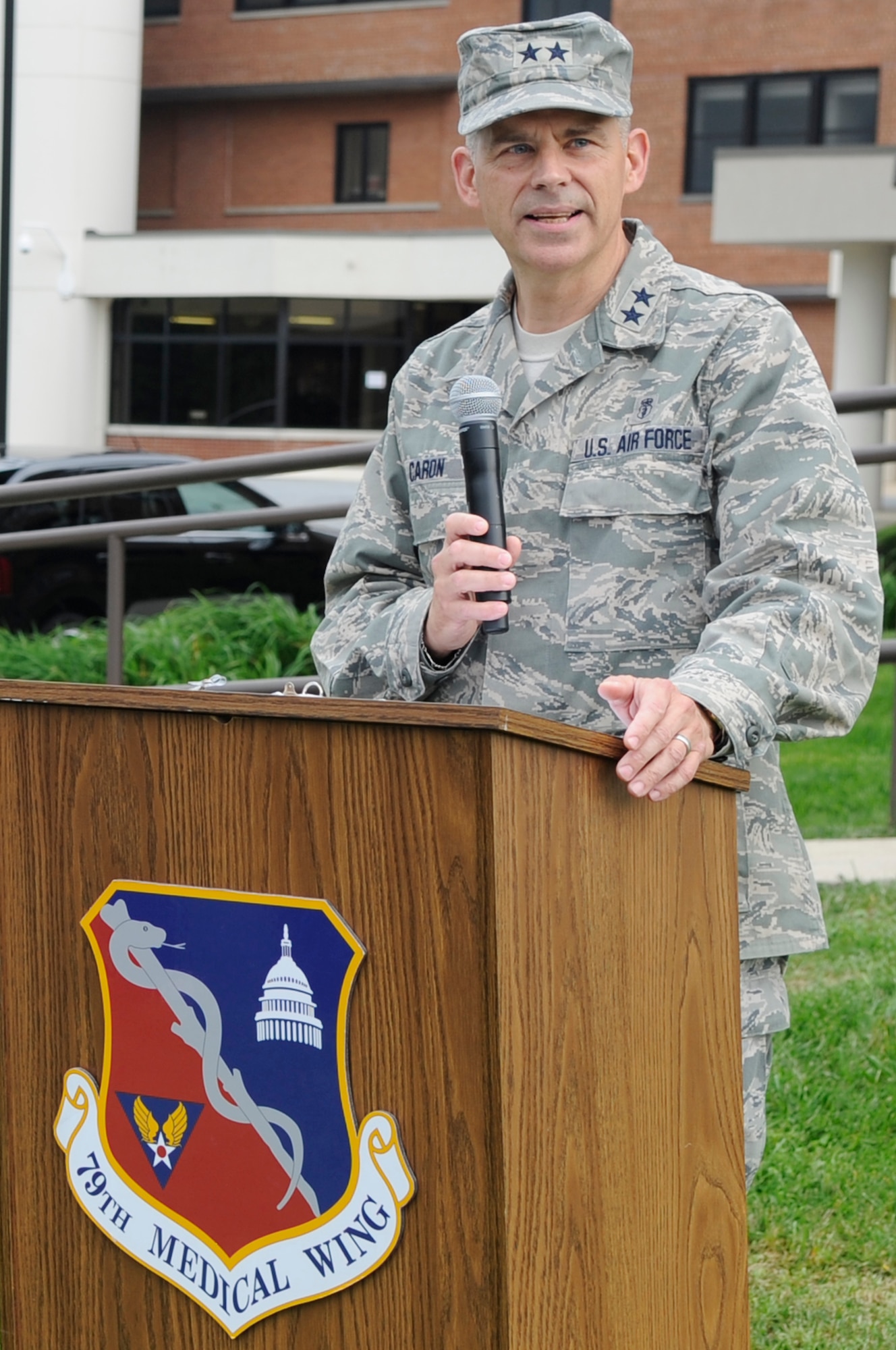 Maj. Gen Gerald Caron, Commander of the 79th Medical Wing, Joint Base Andrews Md., gives closing remarks during a ceremony re-designating Malcolm Grow Medical Center as the Malcolm Grow Medical Clinic. Malcolm Grow Medical Clinic will continue it’s more than 56 years of service with a new mission that will include “providing fitness for duty determinations for Air Force members assigned to the European Theater.” (U.S. Air Force photo by Staff Sgt. Raymond Mills) 