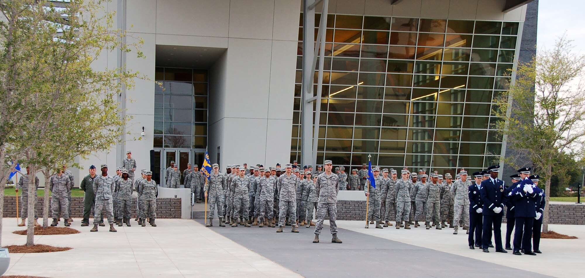 BOSSIER CITY, La. - Members of the Eighth Air Force Headquarters, 608th Air and Space Operations Center and 608th Air Communications Squadron stand in formation for a reveille ceremony at the Cyber Innovation Center in celebration of the Air Force’s 64th birthday Sept. 16. Sixty-four years ago, President Harry Truman signed the National Security Act of 1947, establishing the United States Air Force as a separate military service. Since Sept. 18, 1947, the U.S. Air Force – through its Airmen and technology – has played a key role in the defense of the U.S., maintenance of peace and humanitarian operations around the world. (U.S. Air Force photo by Staff Sgt. Brian Stives)