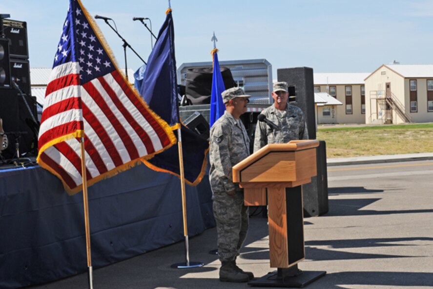 Tech. Sgt. Fletcher Harris from the 124th Fighter Wing (FW) sings the National Anthem on Sept. 11 in honor of the memory of Sept. 11, 2001. Members of the 124th FW gathered at Gowen Field, Boise, Idaho to remember that tragic day. (U.S. Air Force photo by Tech. Sgt. Becky Vanshur)