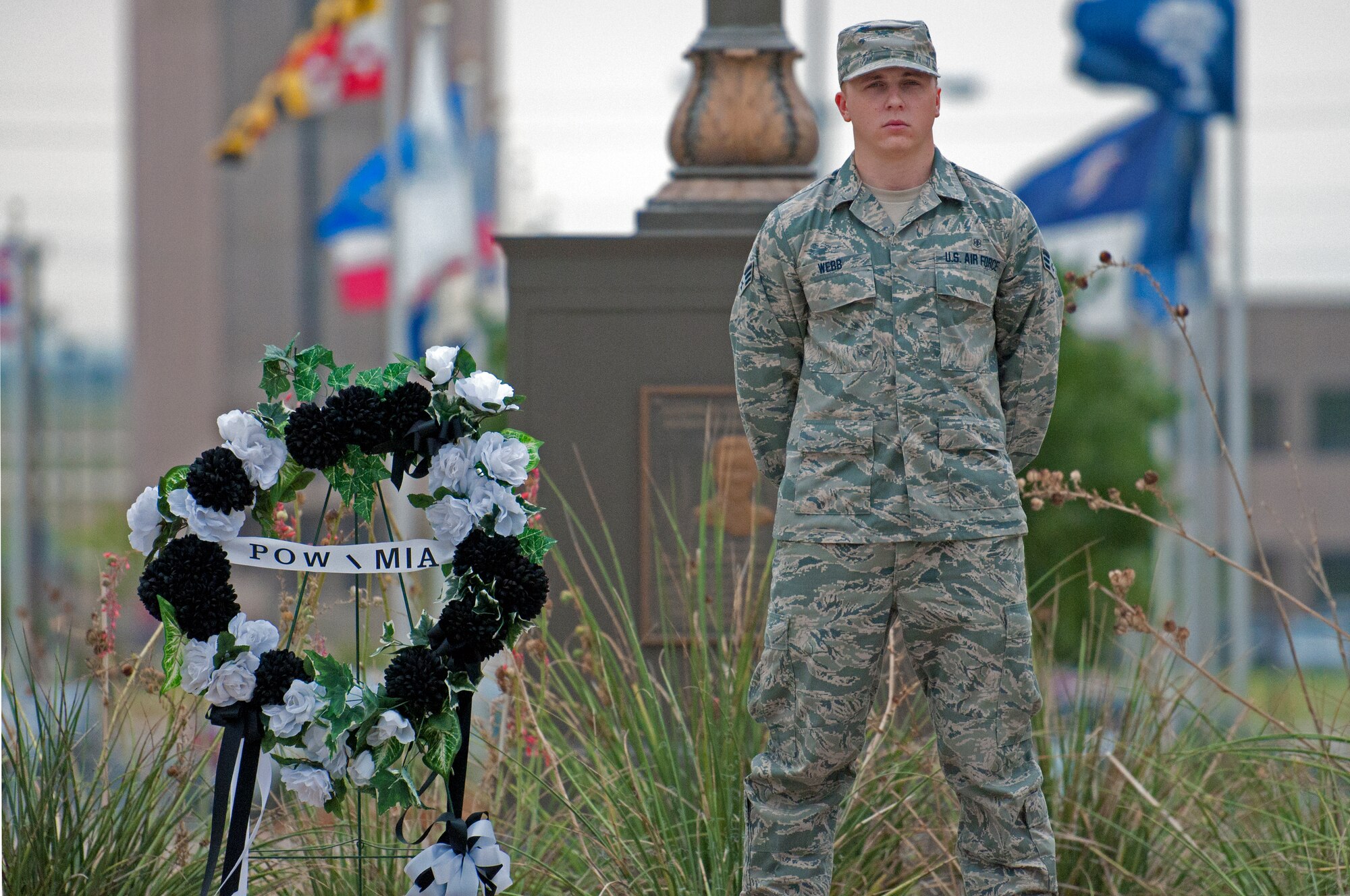 LAUGHLIN AIR FORCE BASE, Texas – Senior Airman Cody Webb, 47th Medical Support Squadron, stands vigil over a Prisoners of War/Missing in Action wreath at Heritage Park here Sept. 16. Laughlin Airmen are playing their part on National POW/MIA Recognition Day and remembering the sacrifices made by POW and MIA servicemembers with a vigil throughout the day and a retreat ceremony. (U.S. Air Force photo/Senior Airman Scott Saldukas) 