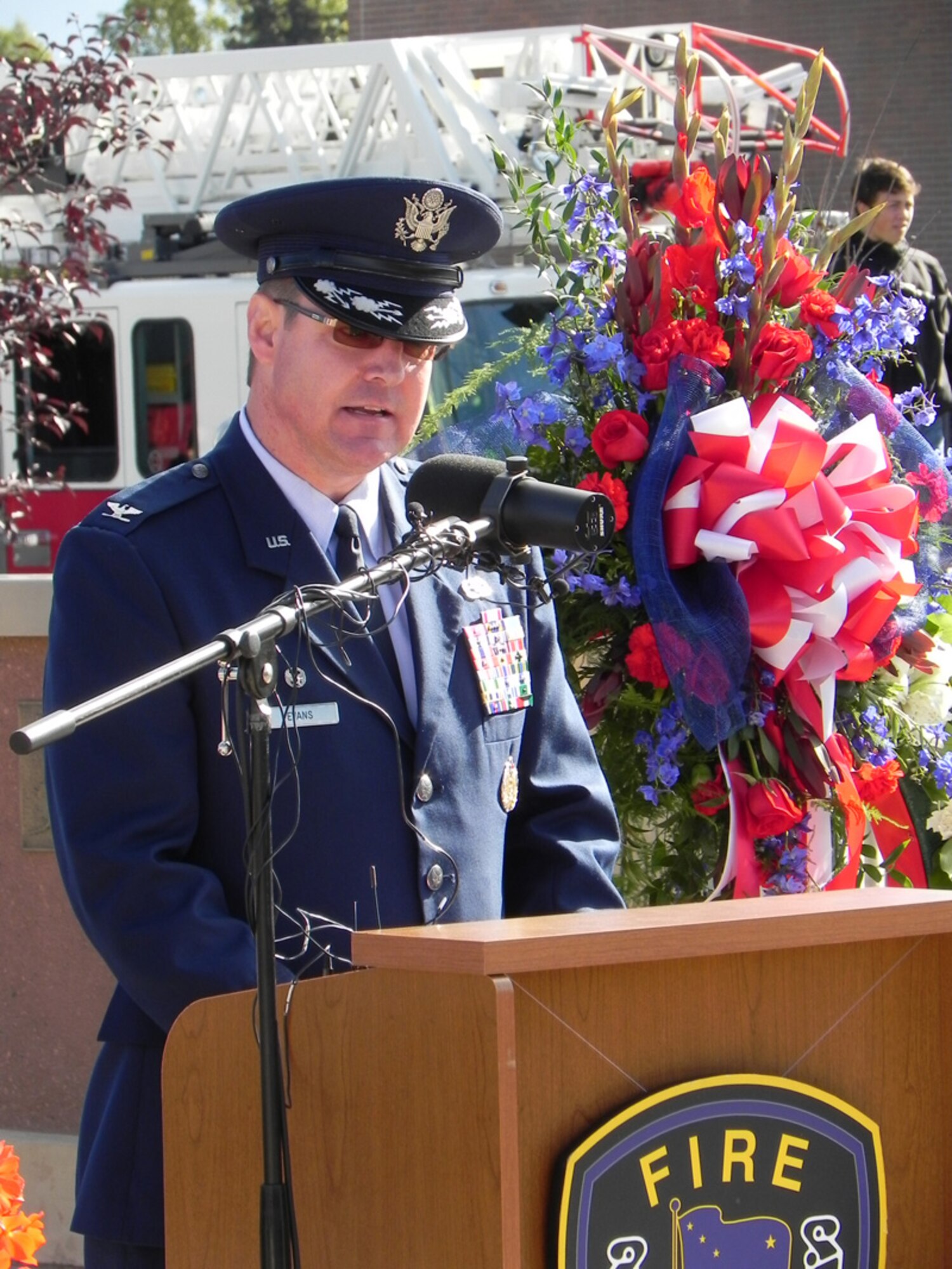 Air Force Col. Robert Evans, Joint Base Elmendorf-Richardson and 673rd Air Base
Wing commander, speaks at the memorial ceremony at Anchorage Fire Station 1. (U.S. Air Force photo/Tommie Baker)