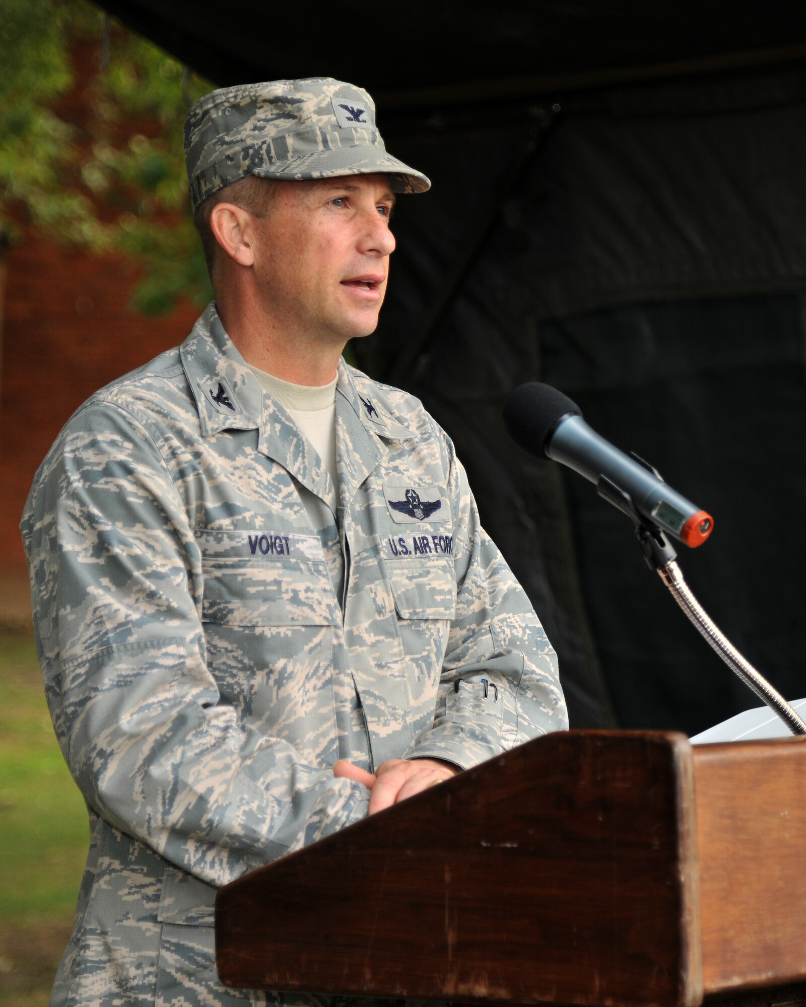 RAF MILDENHALL, England – Col. Kyle Voigt, 100th Air Refueling Wing vice commander, reads the names of America’s Prisoners of War and Missing in Action during the POW/MIA 24-hour vigil here Sept 15, 2011. Voigt, along with more than 100 Airmen participated in the vigil honoring the men and women who have sacrificed much in the defense of our country. The nation renews its promise “You are not forgotten.” (U.S. Air Force photo by Senior Airman Jerilyn Quintanilla)