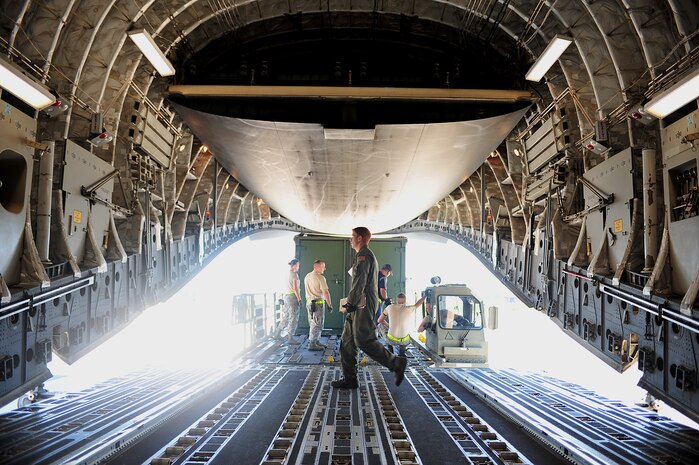 U.S. Air Force Senior Airman Seth Dunworth, a loadmaster with the 15th Airlift Squadron runs through a preflight checklist on the ramp of a C-17 Globemaster III on the Joint Base Charleston, S.C., flightline Sept. 7, 2011. (U.S. Air Force photo/Staff Sgt. Nicholas Pilch) (RELEASED)