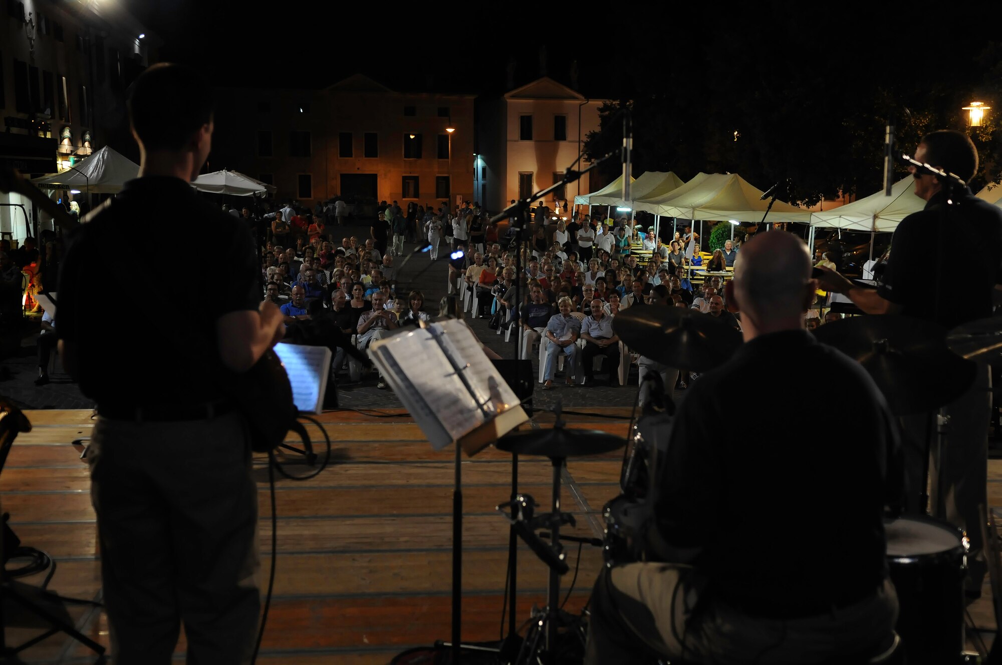 The band "Direct Hit," one of the United States Air Forces in Europe Band's popular music ensembles performs in the Aviano town square Sept. 15. Playing hits from the 60's and beyond, Direct Hit features a dynamic horn section, talented vocalists and a hard hitting rhythm section. (U.S. Air Force photo/Staff Sgt. Justin Weaver)