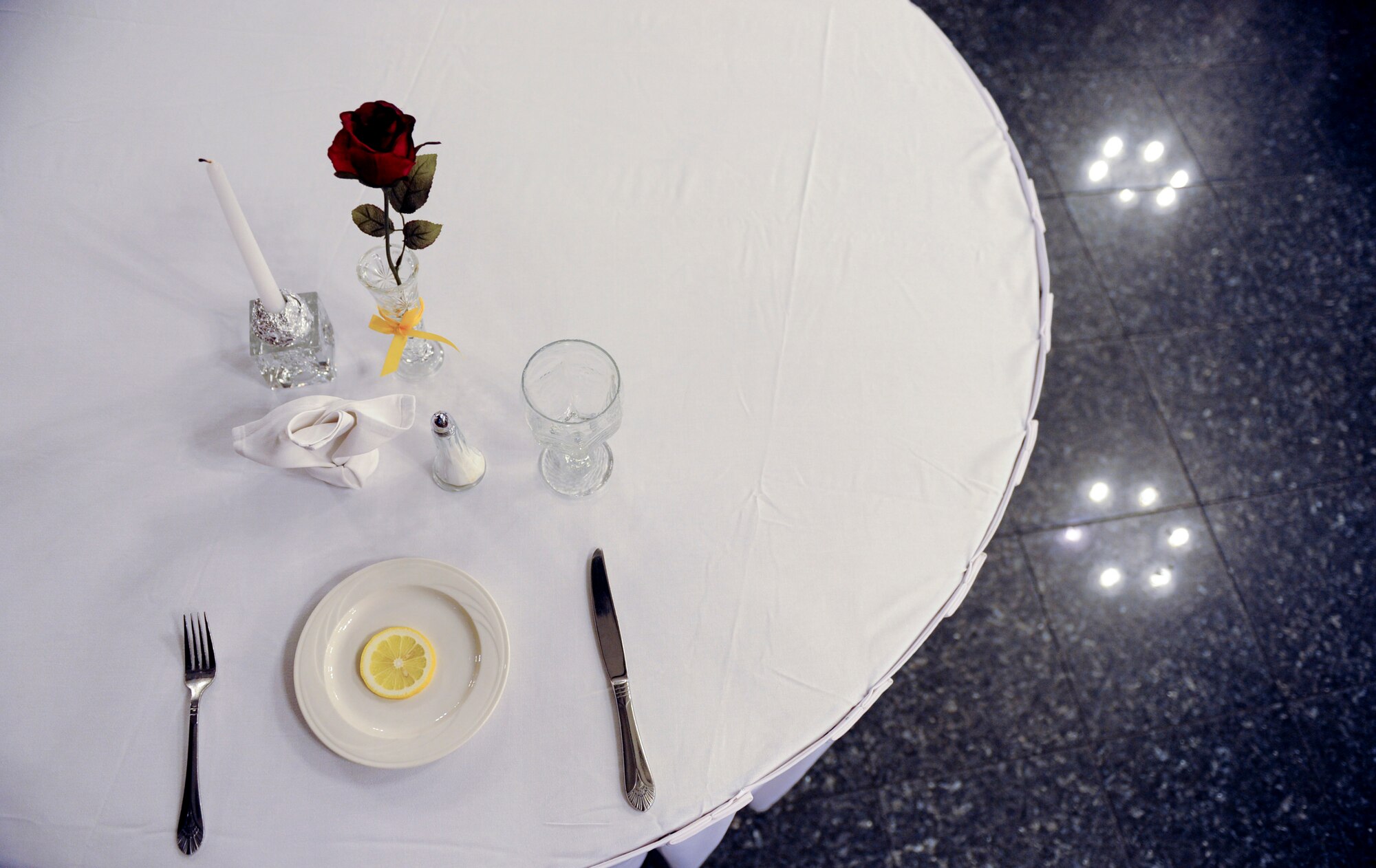 An empty place setting is prepared for those still missing during the Kadena Air Base Prisoner of War and Missing in Action ceremony Sept. 16, 2011. The national POW/MIA recognition day is observed on the third Friday of September every year, but it is important to always remember the sacrifice of prisoners of war and those missing in action. (U.S. Air Force photo by Airman 1st Class Brooke P. Beers)     