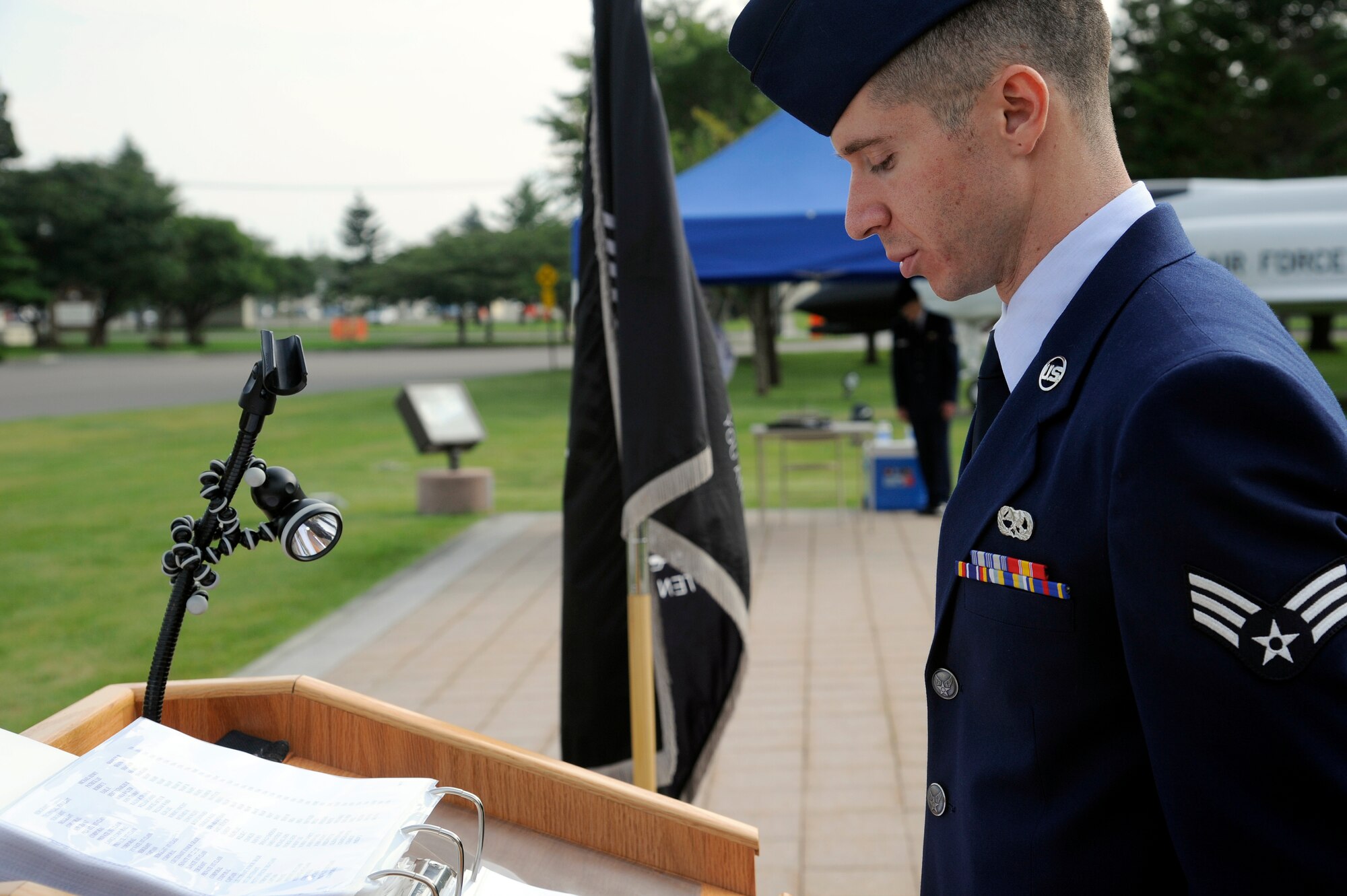 MISAWA AIR BASE, Japan - U.S. Air Force Senior Airman Jared Martinez, 35th Maintenance Squadron, announces names during Misawa's POW/MIA Recognition Day vigilance ceremony here Sept. 16. More than 90 Airmen and Sailors stood for 15 minutes at a time announcing names of fallen heroes from the Vietnam and Korean wars during the 24-hour vigilance. This is the second year Misawa Air Base has held this vigilance. (U.S. Air Force photo/Tech. Sgt. Marie Brown)