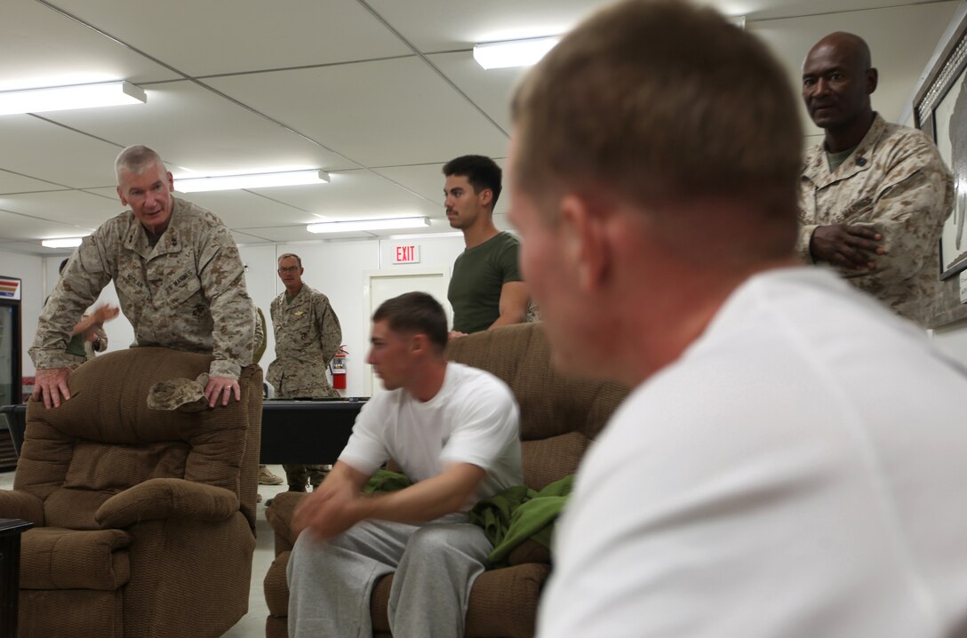 Maj. Gen. John A. Toolan (left), commanding general of Regional Command Southwest, and Sgt. Maj. Michael F. Jones, sergeant major for RC(SW), visit with Marines at the wounded warrior care center aboard Camp Leatherneck, Afghanistan, Sept. 17. Toolan, accompanied by members of the 2nd MLG (FWD) command deck, toured several facilities operated by the unit. (U.S. Marine Corps photo by Sgt. Justin J. Shemanski)