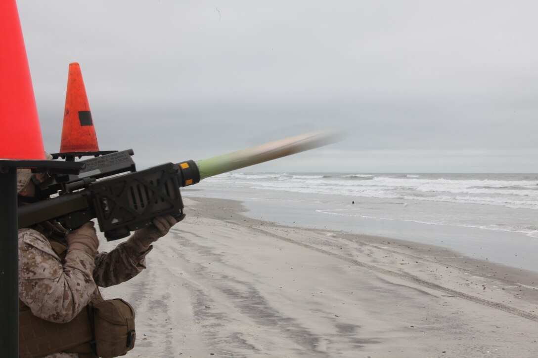 A Marine with 2nd Low Altitude Air Defense Battalion fires a PL-87 Stinger Missile at an unmanned aerial target on Onslow Beach aboard Marine Corps Base Camp Lejeune, N.C. during 2nd LAAD's live Stinger Missile shoot Sept. 17. “The threats that we face as a LAAD battalion range from manned enemy aircraft to the possibility of an air to land missiles that need to be taken out,” said Master Sgt. Joshua J. Hillbrand, operations chief for 2nd LAAD Bn. “There are a lot of threats in the world and the things we have seen are not traditional threats.”