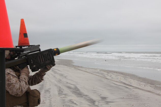 A Marine with 2nd Low Altitude Air Defense Battalion fires a PL-87 Stinger Missile at an unmanned aerial target on Onslow Beach aboard Marine Corps Base Camp Lejeune, N.C. during 2nd LAAD's live Stinger Missile shoot Sept. 17. “The threats that we face as a LAAD battalion range from manned enemy aircraft to the possibility of an air to land missiles that need to be taken out,” said Master Sgt. Joshua J. Hillbrand, operations chief for 2nd LAAD Bn. “There are a lot of threats in the world and the things we have seen are not traditional threats.”