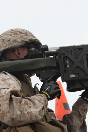 A Marine with 2nd Low Altitude Air Defense Battalion locks on to an unmanned aerial target with his PL-87 Stinger Missile on Onslow Beach aboard Marine Corps Base Camp Lejeune, N.C., during 2nd LAAD's live Stinger Missile shoot Sept. 17. “The air defense battalion is a provisional infantry battalion in the sense when we aren’t firing our missile system at enemy aircraft we are providing security forces for ground troops in theater,” said Lt. Col. Joel A. Burdette, commanding officer of 2nd LAAD Bn. “My Marines here in 2nd LAAD have the knowledge and training to conduct both ground based air defense as well as air based ground defense. We provide the 2nd Marine Aircraft Wing with an air defense umbrella as a key component to Marine Air Control Group 28.”
