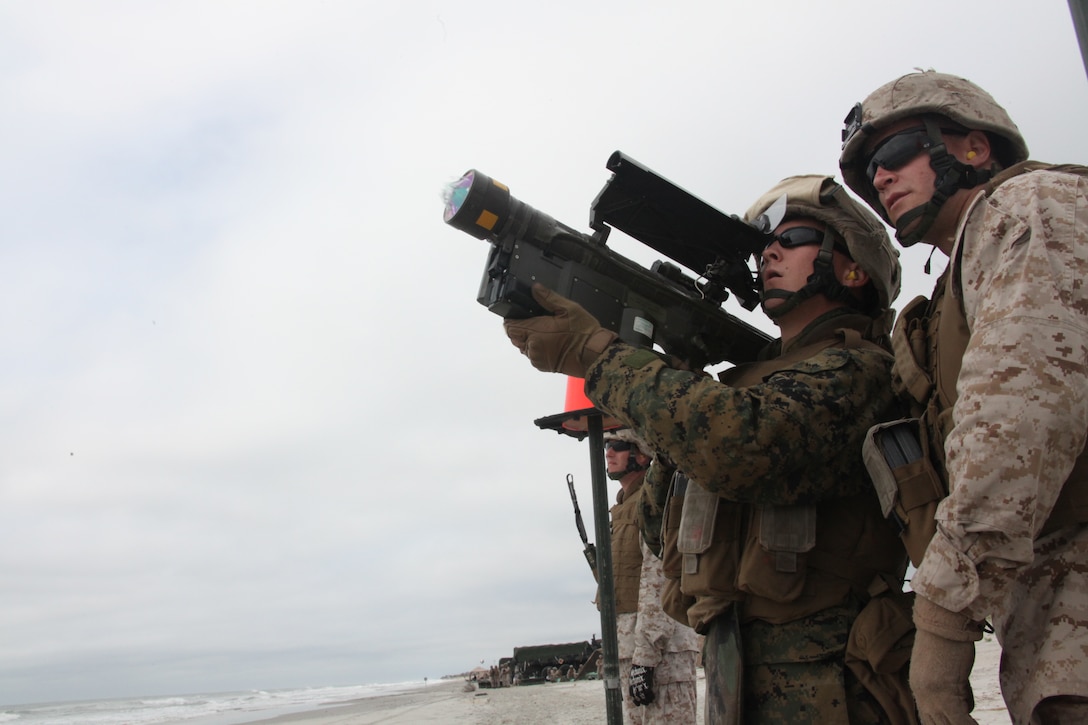 The glass cover of a PL-87 Stinger Missile shatters as the missile is fired off at an unmanned aerial target by a Marine with 2nd Low Altitude Air Defense Battalion on Onslow Beach aboard Marine Corps Base Camp Lejeune, N.C., during 2nd LAAD's live Stinger Missile shoot Sept. 17. “This training provides the Marine Corps with qualified Stinger Missile gunners,” said Master Sgt. Joshua J. Hillbrand, operations chief for 2nd LAAD Bn. “This training allows the Marines to complete their annual training requirements and allows some gunners who haven’t fired in years to fire a live missile.”