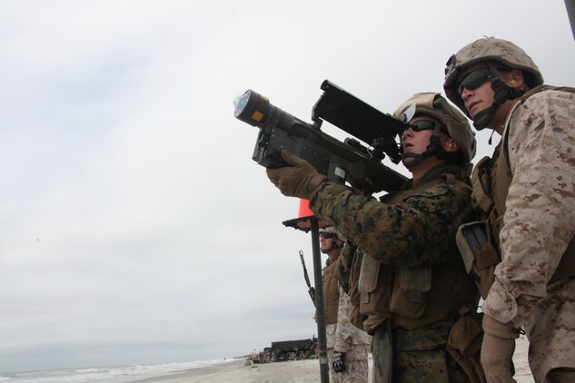 The glass cover of a PL-87 Stinger Missile shatters as the missile is fired off at an unmanned aerial target by a Marine with 2nd Low Altitude Air Defense Battalion on Onslow Beach aboard Marine Corps Base Camp Lejeune, N.C., during 2nd LAAD's live Stinger Missile shoot Sept. 17. “This training provides the Marine Corps with qualified Stinger Missile gunners,” said Master Sgt. Joshua J. Hillbrand, operations chief for 2nd LAAD Bn. “This training allows the Marines to complete their annual training requirements and allows some gunners who haven’t fired in years to fire a live missile.”