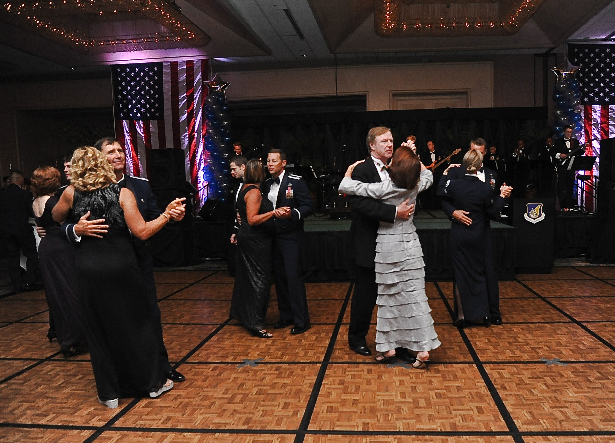 Airmen and guests begin to fill the dance floor at the 64th annual Air Force Ball, held at the Hilton Hawaiian Village in Waikiki, Sept. 16. The ball celebrated the Air Force's 64th year as a seperate service and paid tribute to the heroes that have served throughout its history. (U.S. Air Force photo/Senior Airman Lauren Main)