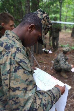 Pfc. Deshan Henderson, an embarkation specialist with the Headquarters and Service Company, 1st Battalion, 2nd Marine Regiment verifies the accuracy of a terrain model being built on Fort Pickett, Va., Sept. 17. More than 900 Marines and sailors are taking part in the Deployment for Training exercise at Fort Pickett, Sept. 6-23. The battalion is scheduled to attach to the 24th Marine Expeditionary Unit as its Battalion Landing Team a few days after the training.