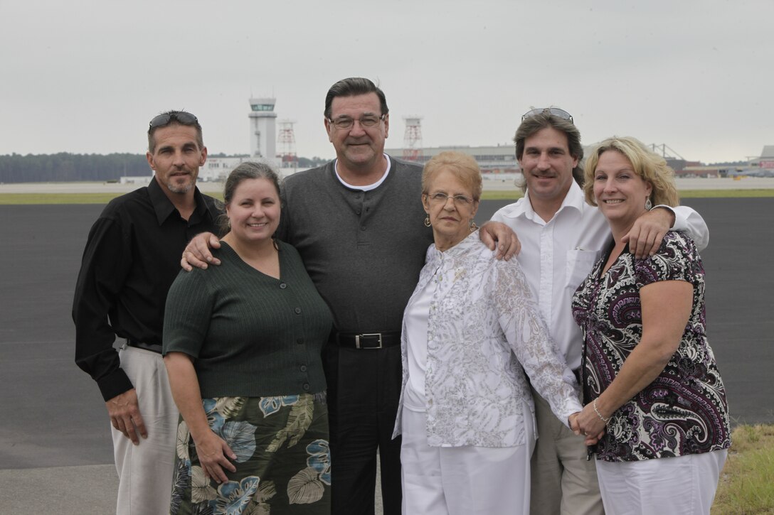 Joe and Maureen Williams, center, celebrated their 50th wedding anniversary at MCAS Cherry Point, N.C., Sept. 18, 2011. Their four children, left to right, Joseph, Cheryl, Billy and Sharon, arranged for them to come out. ::r::::n::