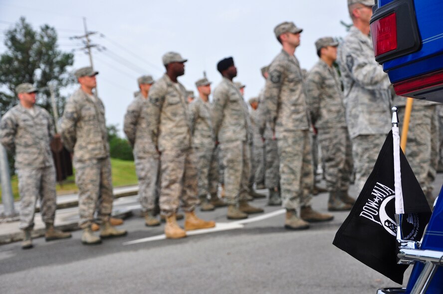 About 100 Airmen formed up Sept. 12 at the 51st Fighter Wing headquarters flagpole to raise the POW/MIA flag and formally start a week honoring all the prisoners of war and those still missing in action. Members of the Osan’s Air Force Sergeants Association honored all POW/MIAs during several ceremonies and events Sept. 12-16. (U.S. Air Force photo/Tech. Sgt. Chad Thompson)