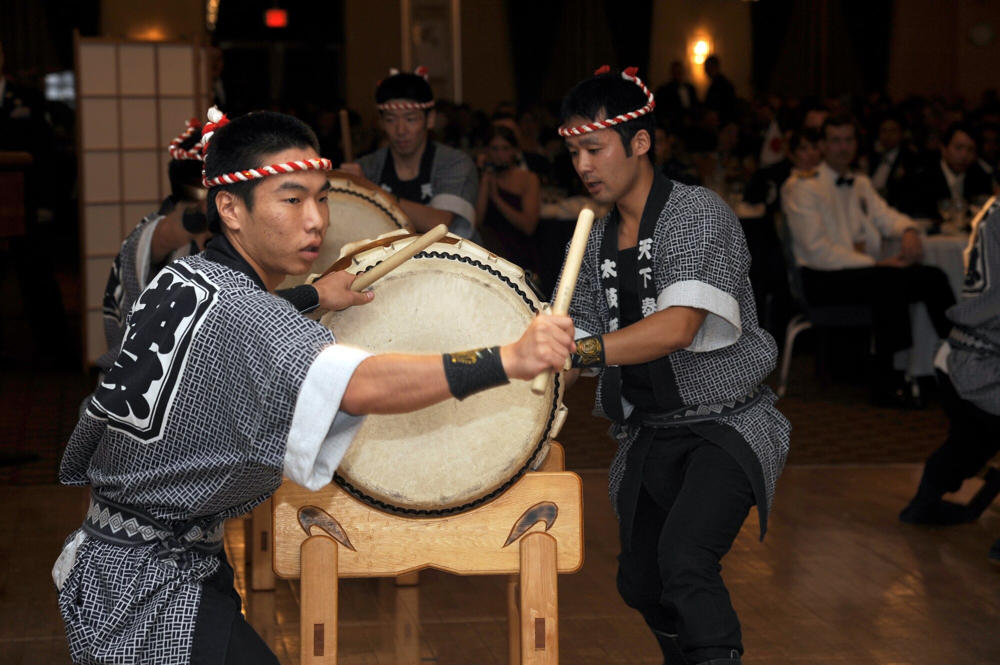 MISAWA AIR BASE, Japan -  Members of the Japan Air Self-Defense Force Tiako Drum team perform for members of 35th Fighter Wing and their guests during the annual Air Force Ball commemorating the 64th anniversary of the Air Force here Sept. 17. Taiko, meaning great or wide drum, is a percussion instrument used for classical and traditional Japanese folk music. (U.S. Air Force photo/Tech. Sgt. Marie Brown)