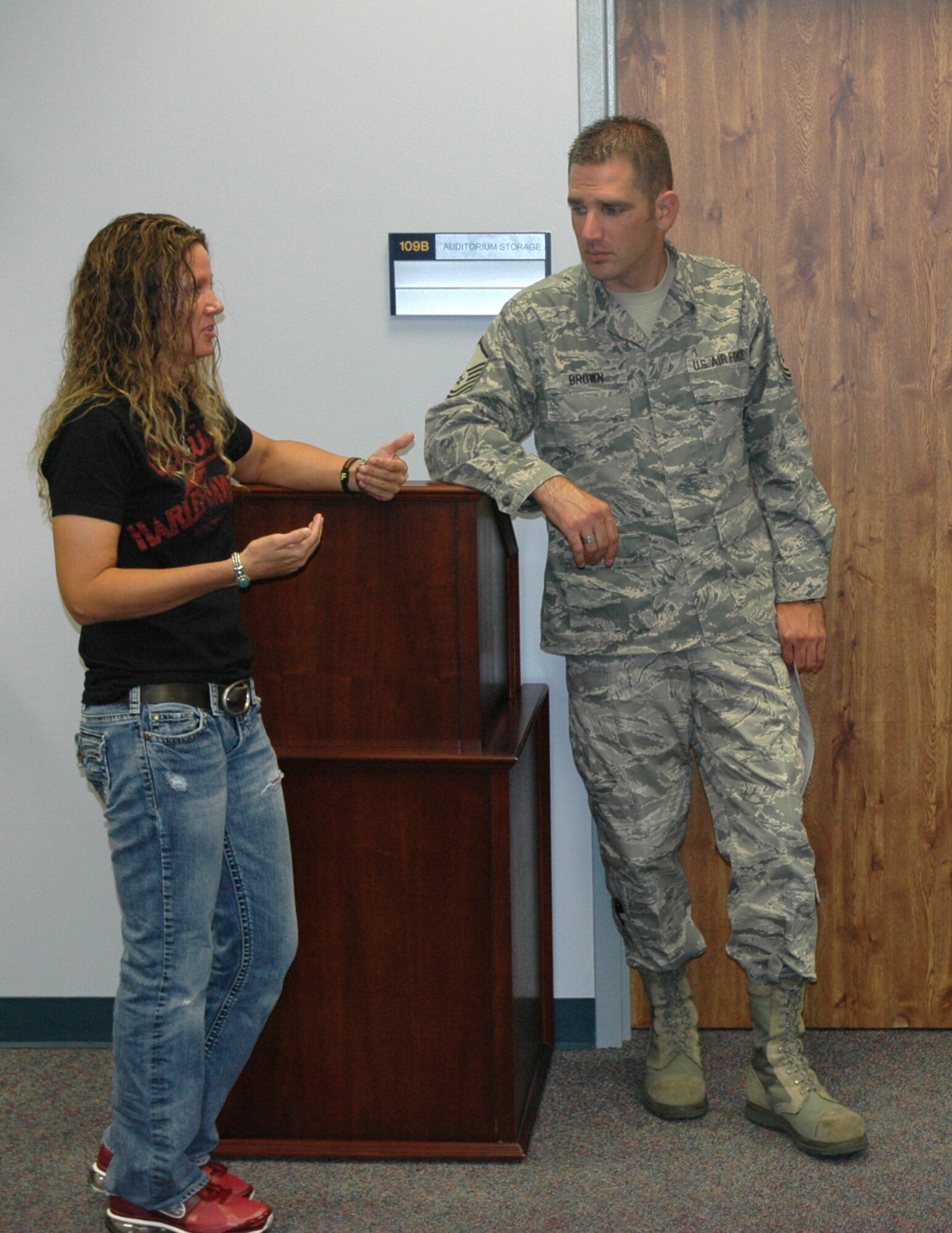 Air Force Master Sgt. Christopher Brown (right), a first-year recruiter for the 446th Airlift Wing, McChord Field, Wash. speaks with Air Force Staff Sgt. Jennifer Eldridge, Sept. 16, 2011. Eldridge was the 72nd person he had enlisted this year, which put him into the Century Club. The Century Club is when a recruiter exceeds his goals at a minimum of 150 percent. Brown is currently at 225 percent. (U.S. Air Force photo by Sandra Pishner)