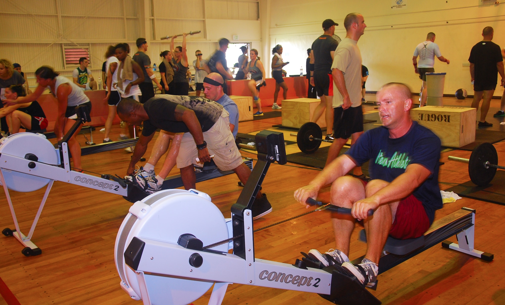 Participants engage in a 17-minute workout for the Fight Gone Bad 6 CrossFit event in the O’Connor Gym on Kadena Air Base, Japan, Sept. 17. 1st Lt. Ashley Jensen, 372nd Training Squadron Det 15 commander and a Shogun CrossFit founder, and other Shogun CrossFit trainers hosted Fight Gone Bad 6 for 94 team members to participate in. Fight Gone Bad is an annual event hosted by CrossFit gyms nationwide to raise money for various organizations. This year, the nationwide event raised over $2 million for the Special Operations Warrior Foundation, the Infant Swim Rescue Foundation, and Camp Patriot. Shogun CrossFit team members raised approximately $9,643 in its first year of participating in Fight Gone Bad. (U.S. Air Force photo/1st Lt. Natassia Cherne)