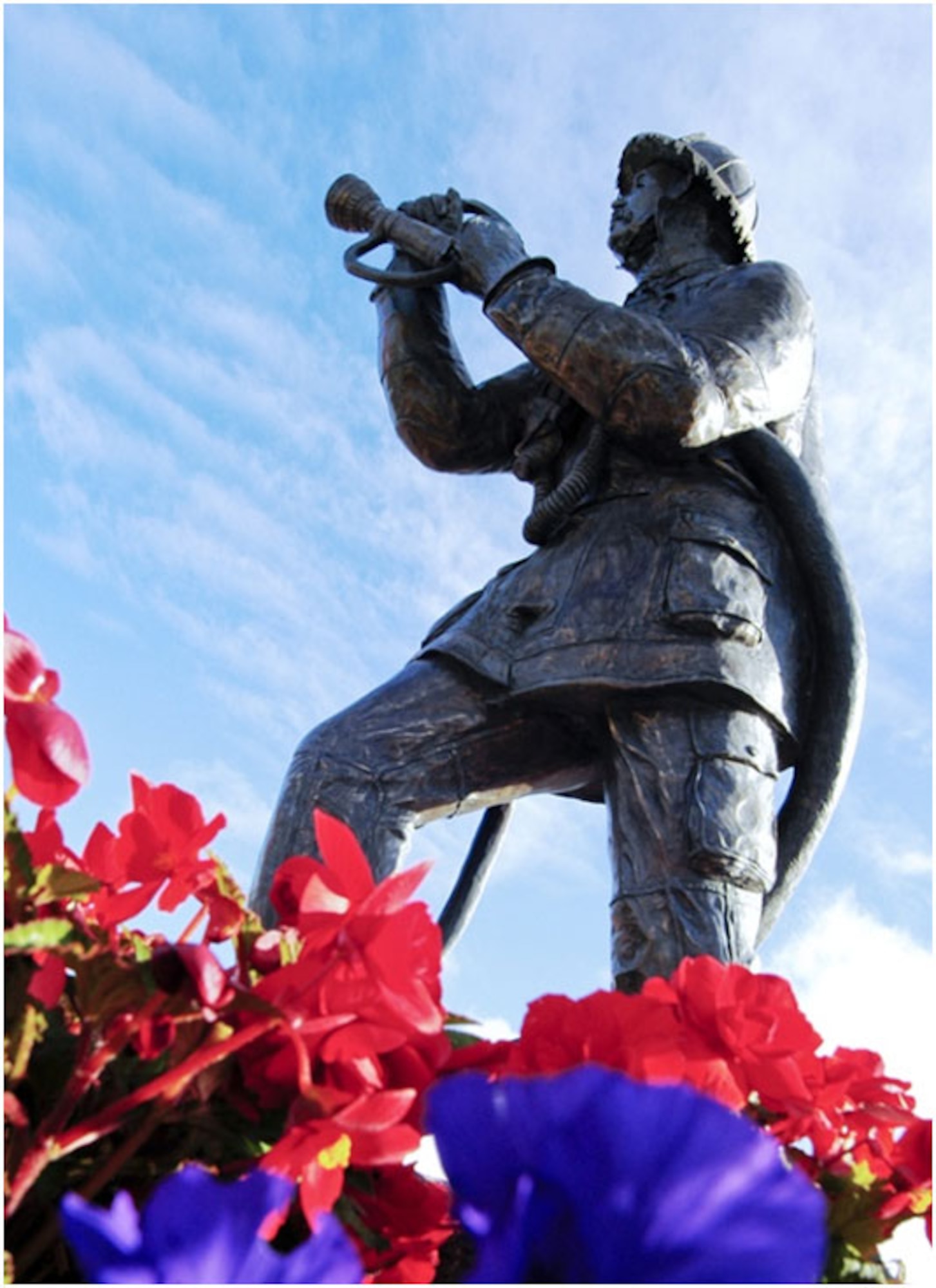 Anchorage -- "Fire and Ice".  The Alaska Fallen Firefighter Memorial, located on the corner of 5th Avenue and A Street, was sculpted by Joe Cipri, a native of Denver, Colo., who served over twenty years with the Denver Fire Department.   (U.S. Air Force photo/Percy Jones)