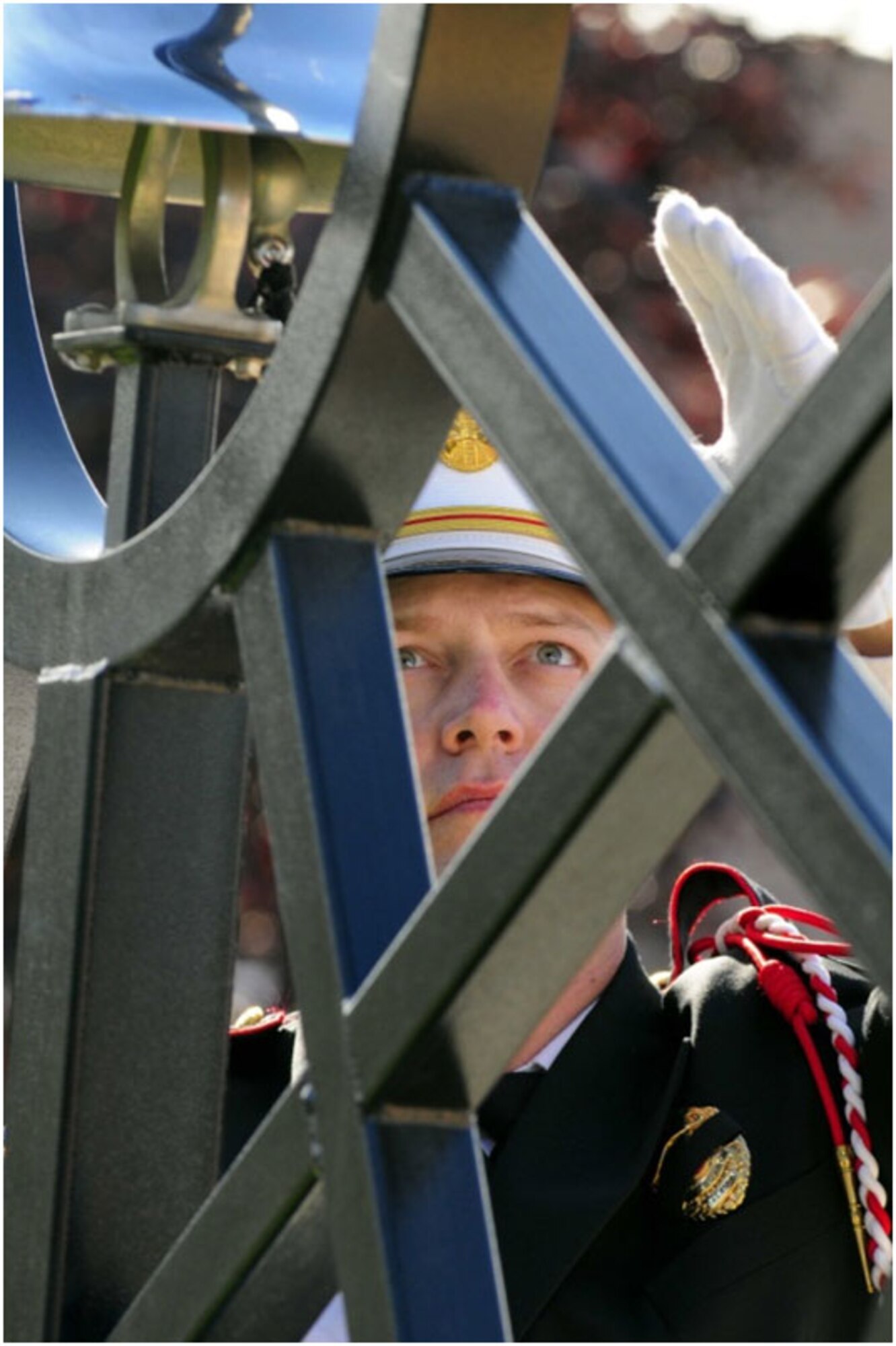 Anchorage -- Anchorage -- Anchorage Fire Department Honor Guard member, Senior Captain Clinton Powell, tolls the Final Alarm Bell as the names of Alaska's fallen firefighters are read by retired Alaska State Fire Marshal and Fire Chief, Craig Goodrich.   (U.S. Air Force photo/Percy Jones)