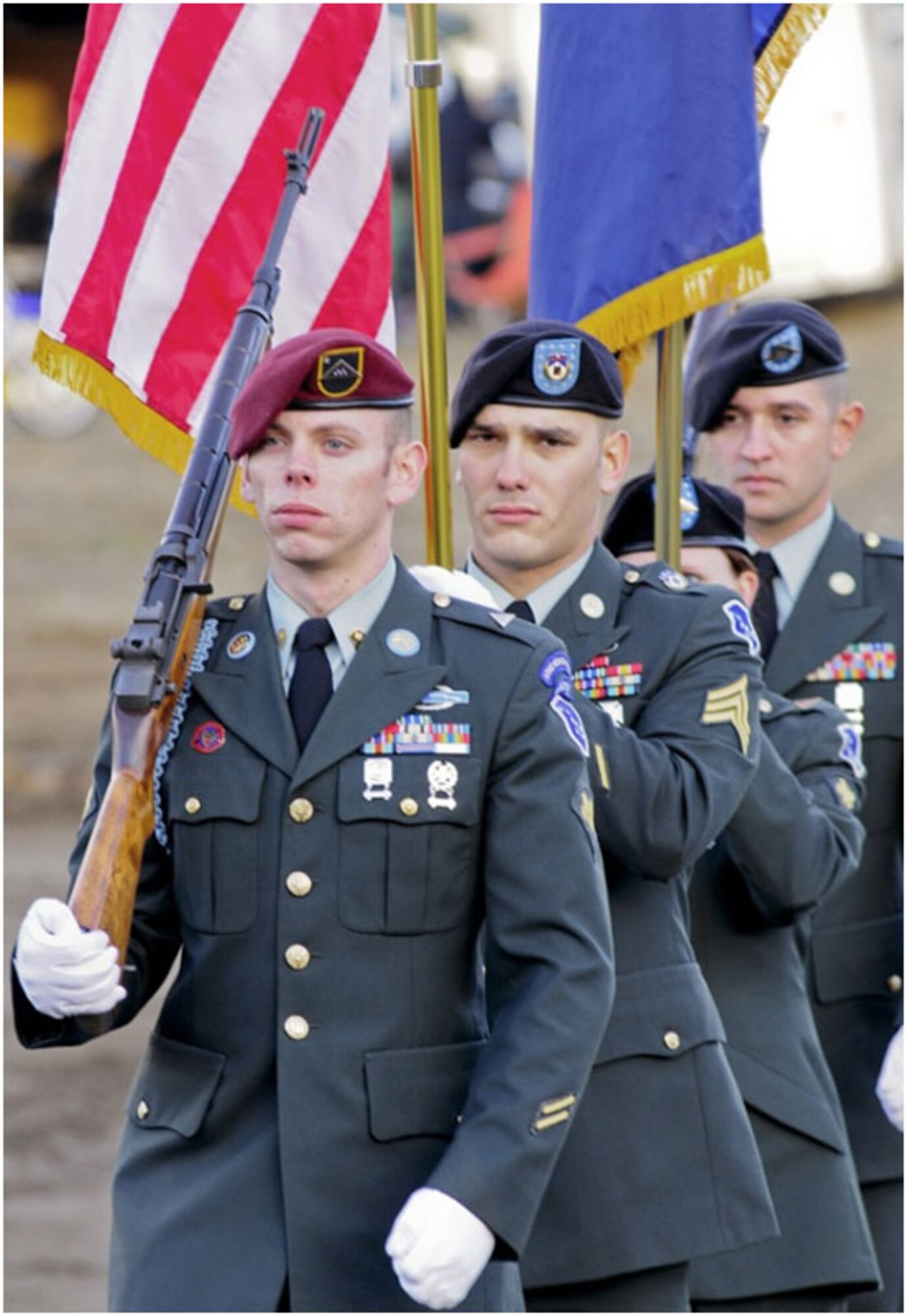 Anchorage -- Soldiers of the Alaska Army National Guard's, Honor Guard, present the colors prior to the start of the September 11th Motocross Races held at the Jodhpur Motocross Track.  In honor of the fallen emergency responders of September 11th, 2001, a fundraiser was also held with all proceeds being dedicated to the State of Alaska Fallen Firefighter Memorial located at 5th Avenue and A Street. (U.S. Air Force photo/Percy Jones)