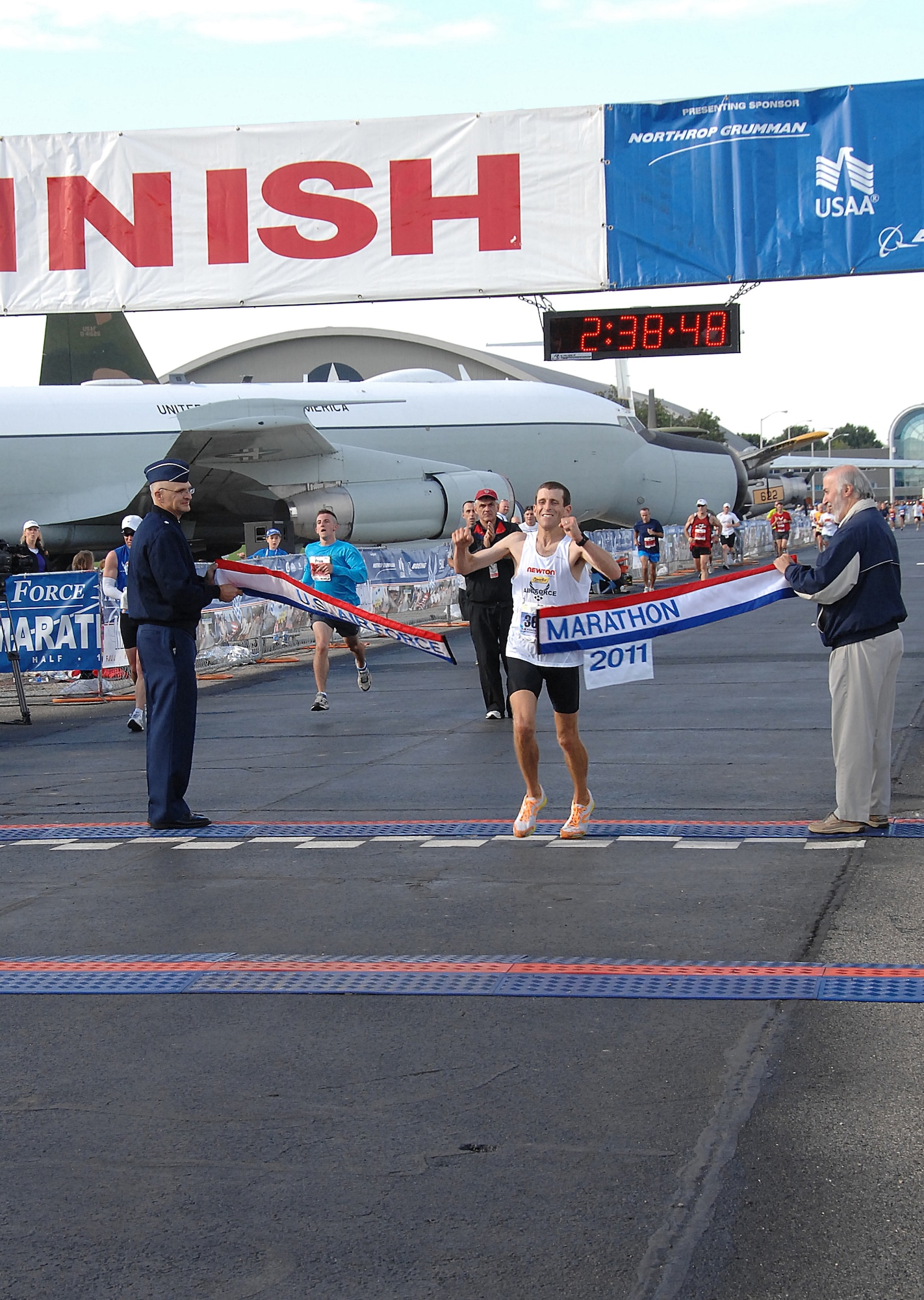 Lt. Col. (Dr.) Mark Cucuzzella finishes in first place at the US Air Force Marathon Sept. 17 with a time of 2:38:48.  The 45-year-old reservist from Shepardstown, W.V., previously won the 2006 Air Force Marathon.  (Air Force photo by Ben Strasser)