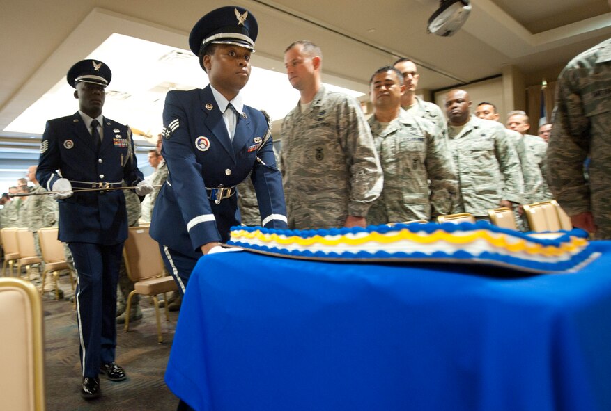 The Moody Air Force Base Honor Guard rolls the Air Force birthday cake towards the official party at Moody AFB, Ga., Sept. 16, 2011. Members of the Moody community gathered to watch a short video reflecting on the 64 years of Air Force history and the cutting of the cake. (U.S. Air Force photo by Airman 1st Class Paul Francis/Released)
