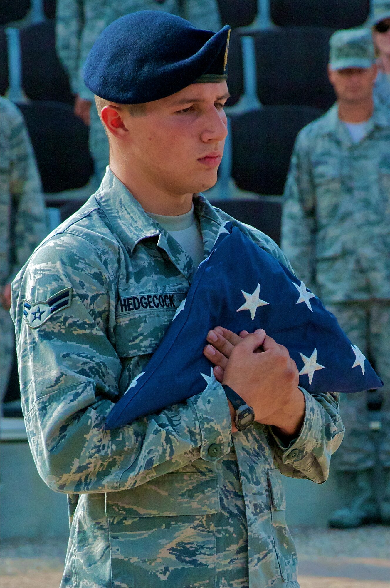 LAUGHLIN AIR FORCE BASE, Texas – Airmen 1st Class Alexander Hedgecock, 47th Security Forces Squadron, carries the U.S. Flag during a National POW/MIA Recognition Day retreat ceremony at Heritage Park here Sept. 16. Laughlin Airmen played their part by remembering the sacrifices made by POW and MIA servicemembers with a vigil throughout the day and a retreat ceremony. (U.S. Air Force photo/Senior Airman Scott Saldukas)