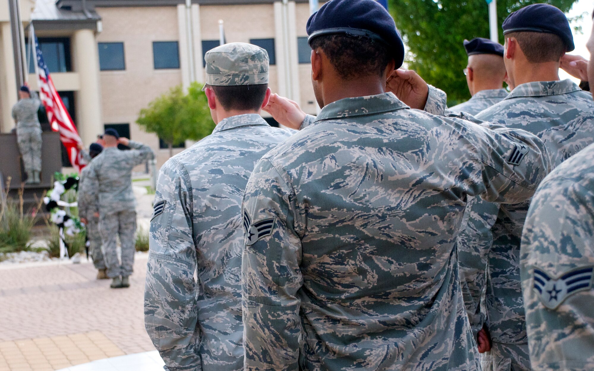 LAUGHLIN AIR FORCE BASE, Texas – Airmen salute during a National POW/MIA Recognition Day retreat ceremony at Heritage Park here Sept. 16. Laughlin Airmen played their part by remembering the sacrifices made by POW and MIA servicemembers with a vigil throughout the day and a retreat ceremony. (U.S. Air Force photo/Senior Airman Scott Saldukas)