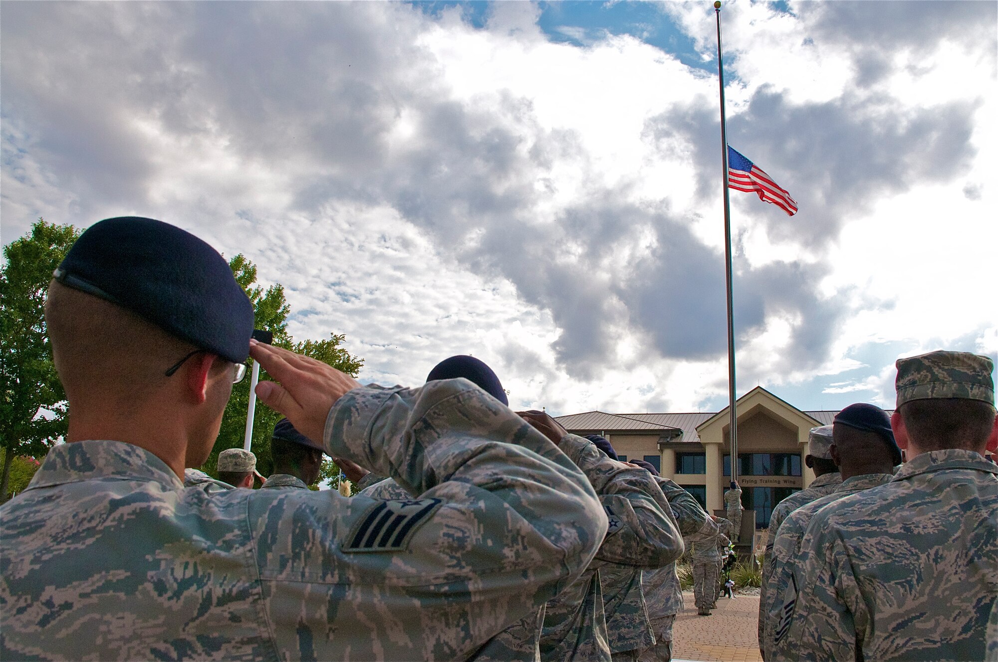 LAUGHLIN AIR FORCE BASE, Texas – Airmen salute during a National POW/MIA Recognition Day retreat ceremony at Heritage Park here Sept. 16. Laughlin Airmen played their part by remembering the sacrifices made by POW and MIA servicemembers with a vigil throughout the day and a retreat ceremony. (U.S. Air Force photo/Senior Airman Scott Saldukas)