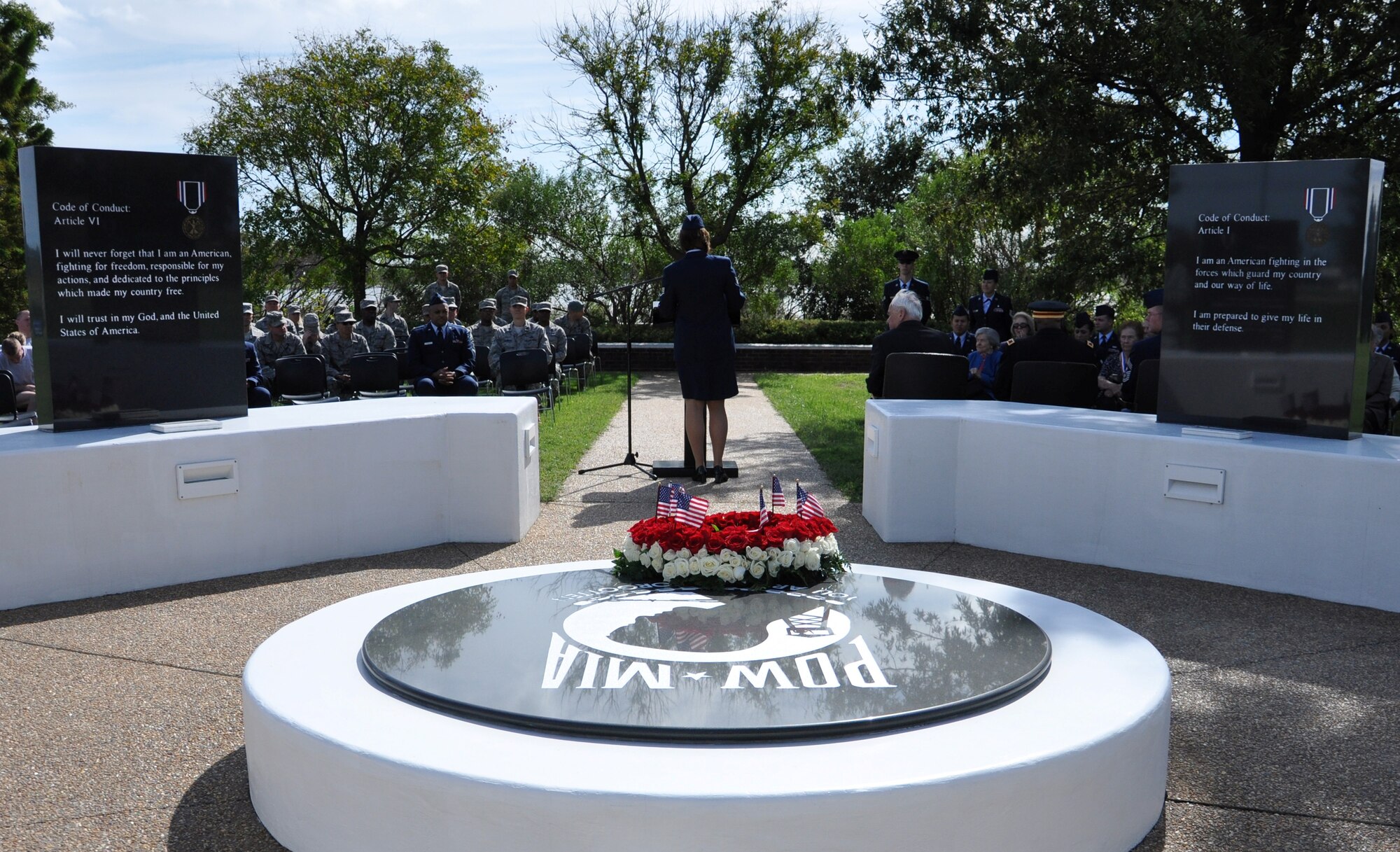 A wreath adorned with miniature American flags rests on the granite memorial during the Joint Base Langley-Eustis National POW/MIA Recognition Day Ceremony Sept. 16, 2011. The ceremony honored all servicemembers ever taken as prisoners of war and those still missing in action. There are more than 83,000 American servicemembers missing from World War II, the Korean War, the Cold War, the Vietnam War and the 1991 Gulf War. (U.S. Air Force photo by Senior Airman Jason J. Brown/RELEASED)