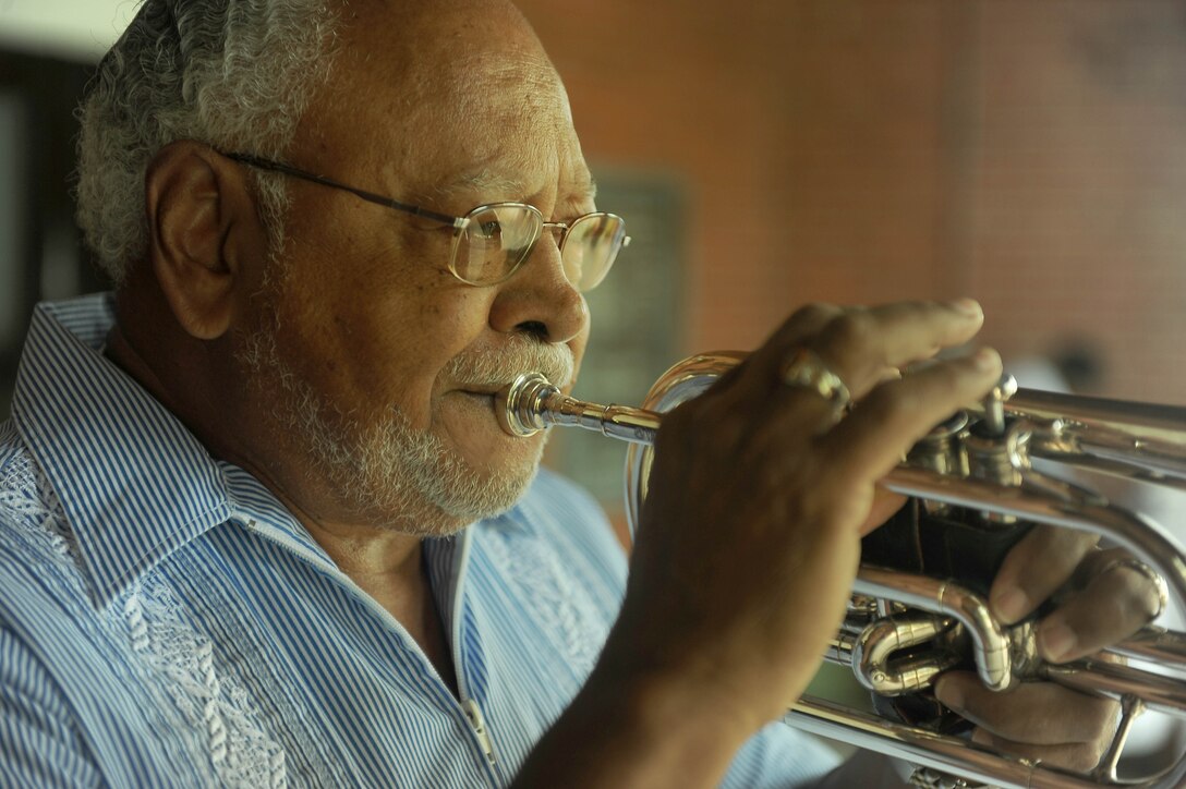 Bob Ransom, a U.S. Air Force retiree, plays taps during the National POW/MIA Recognition Day ceremony September 16, 2011, at Franklin Murphy Chapel at the Hampton Veteran’s Affairs Medical Center. Taps is a military tradition that honors the fallen. (U.S. Air Force photo by Staff Sgt. Antoinette Gibson/Released)