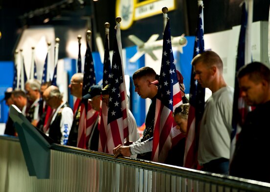Members of the Patriot Guard observe a moment of silence at the POW/MIA ceremony Sept. 16 at the Air Force Armament Museum. The ceremony paid tribute to those military members who have yet to return home from defending America. The event was hosted by the 46th Test Wing and featured guest speakers, honor guard procedures and a flyover by the 53rd Wing. (U.S. Air Force photo/Samuel King Jr.)
