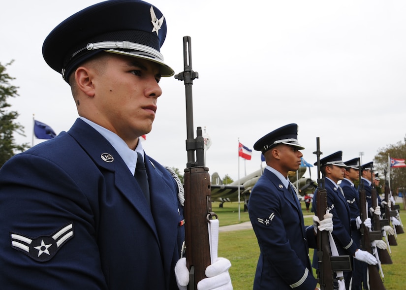 Joint Base Charleston honor guard members stand with their weapons prior to the Prisoner of War/Missing in Action retreat ceremony held Sept. 16. The honor guard members performed a 21 gun salute in honor of the nation's fallen. (U.S. Air Force photo/Staff Sgt. Katie Gieratz) (Released)