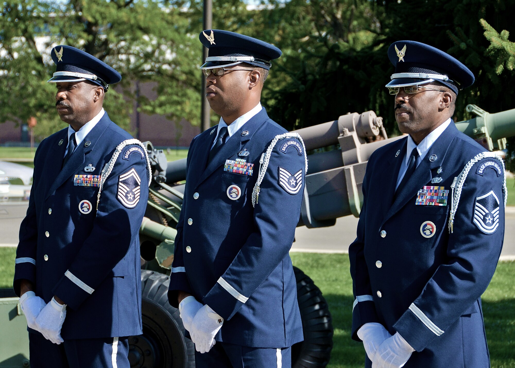 WRIGHT-PATTERSON AIR FORCE BASE, Ohio – Senior Master Sgt. Michael Bailey, Technical Sgt. Ronald Marshall, and Master Sgt. Mark Lyle stand ready to escort the flag during retreat Sept. 15. Wright-Patt honored National POW/MIA Recognition Day with a wreath laying ceremony at the Arnold House prior to the retreat. The retreat was held that the 88th Air Base Wing Headquarters flagpole. (U.S. Air Force photo/Senior Airman Mikhail Berlin)