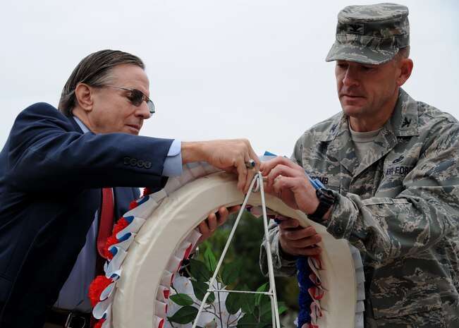 Chuck Jackson and Colonel Richard McComb lay a wreath during the Prisoner of War/Missing in Action retreat ceremony Sept. 16. Mr. Jackson is a former POW and Col. McComb is the 628th Air Base Wing commander. The wreath laying is a gesture of appreciation for our fallen veterans. (U.S. Air Force photo/Staff Sgt. Katie Gieratz) (Released)