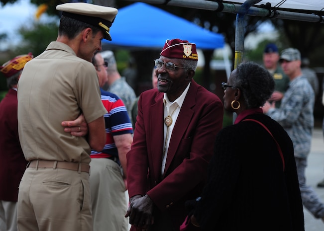 U.S. Navy Capt. Ralph Ward speaks with former prisoner of war, Jacob Scott after the POW/MIA Rememberance Day Retreat Ceremony on September 16, 2011, Joint Base Charleston, S.C.  Joint Base Charleston honored POW/MIA rememberance day with a 24-hour run that ended at the retreat ceremony followed by a wreath laying and a fly-over.  Scott was one of four former POW's in attendance at the retreat ceremony.  He served in the Army as a corporal during the Korean Conflict.  (U.S. Air Force photo/ Staff Sgt. Nicole Mickle) (RELEASED)  