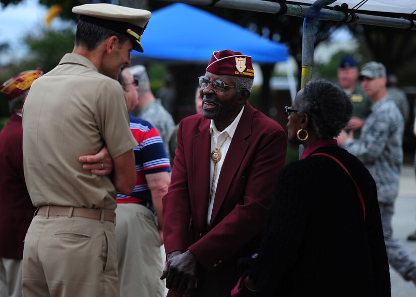 U.S. Navy Capt. Ralph Ward speaks with former prisoner of war, Jacob Scott after the POW/MIA Rememberance Day Retreat Ceremony on September 16, 2011, Joint Base Charleston, S.C.  Joint Base Charleston honored POW/MIA rememberance day with a 24-hour run that ended at the retreat ceremony followed by a wreath laying and a fly-over.  Scott was one of four former POW's in attendance at the retreat ceremony.  He served in the Army as a corporal during the Korean Conflict.  (U.S. Air Force photo/ Staff Sgt. Nicole Mickle) (RELEASED)  