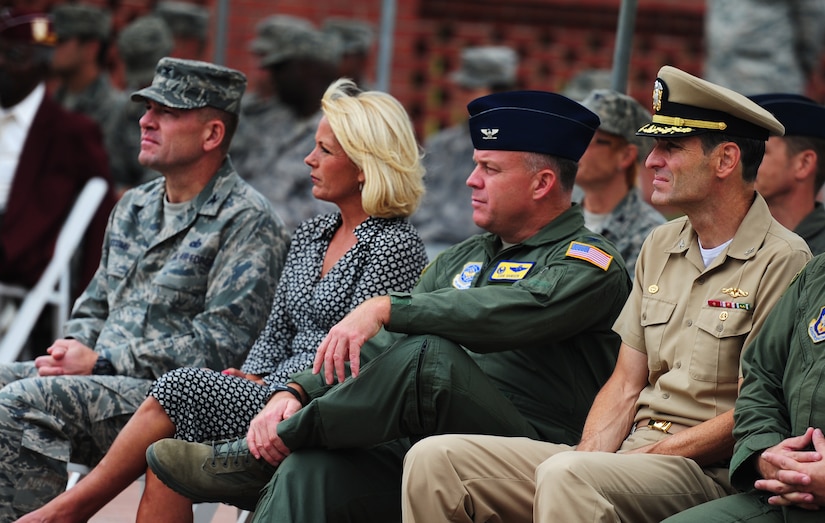 U.S. Air Force Col. Richard McComb, Col. Erik Hansen, and  Navy Capt. Ralph Ward wait for the Prisoner of War/Missing in Action Retreat Ceremony to begin on September 16, 2011, Joint Base Charleston, S.C.  Team Charleston honored POW/MIA rememberance d Base ay with a 24-hour run that ended at the retreat ceremony followed by a wreath laying and a fly-over.  Former POW's were in attendance.  Colonel McComb is the Joint Base Charleston commander, Colonel Hansen is the 437th Airlift Wing commander, and Captian Ward is the Joint Base Charleston vice commander.  (U.S. Air Force photo/ Staff Sgt. Nicole Mickle) (RELEASED)  