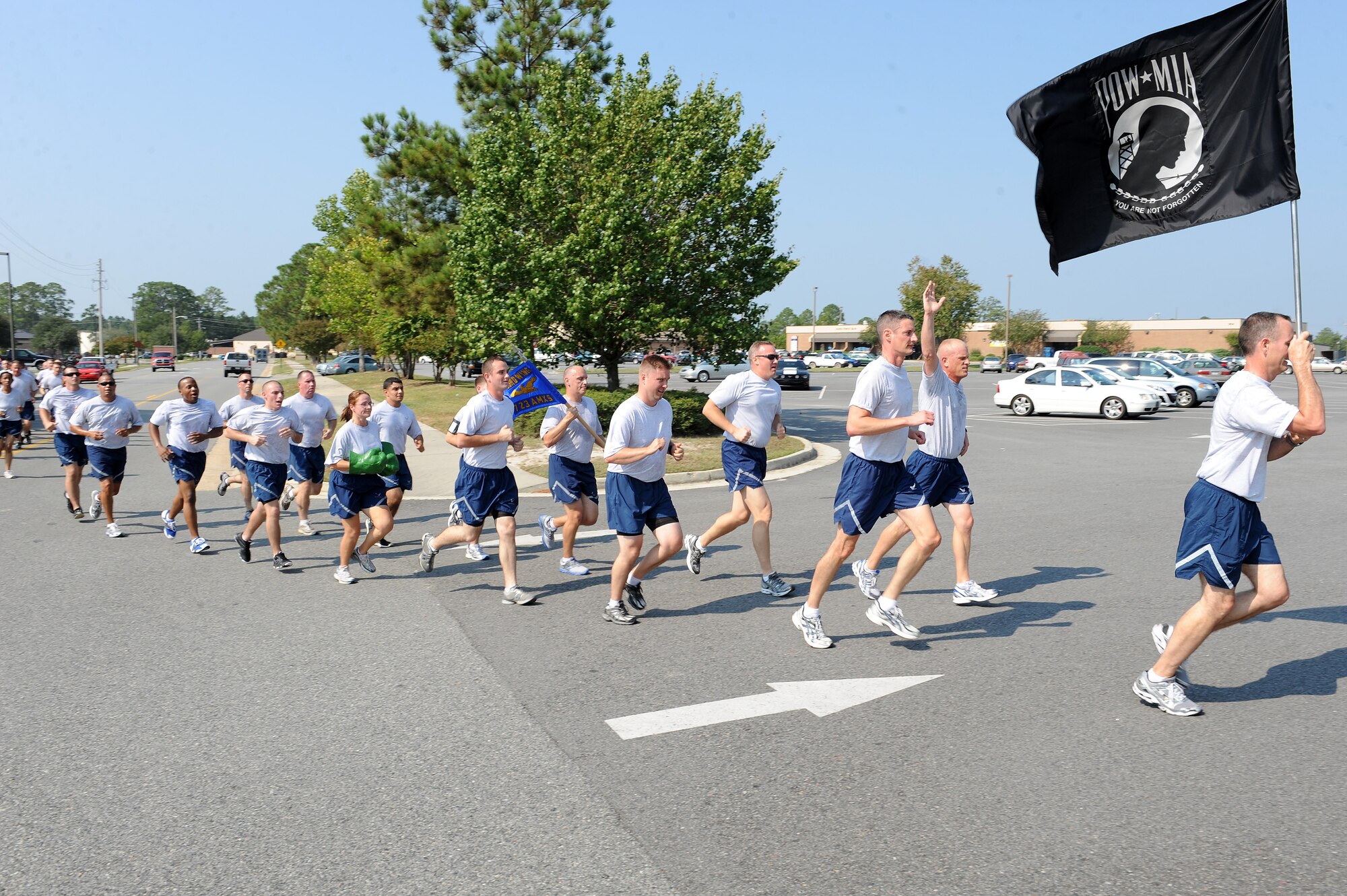 U.S. Air Force Col. Billy Thompson, 23rd Wing commander, leads the final leg of a Tiger-thon at Moody Air Force Base, Ga., Sept. 16, 2011. The 23-mile run was completed in one-mile increments by different organizations in honor of those missing in action and prisoners of war.(U.S. Air Force photo by Senior Airman Ciara Wymbs/Released) 
