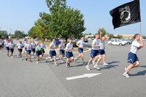 U.S. Air Force Col. Billy Thompson, 23rd Wing commander, leads the final leg of a Tiger-thon at Moody Air Force Base, Ga., Sept. 16, 2011. The 23-mile run was completed in one-mile increments by different organizations in honor of those missing in action and prisoners of war.(U.S. Air Force photo by Senior Airman Ciara Wymbs/Released) 
