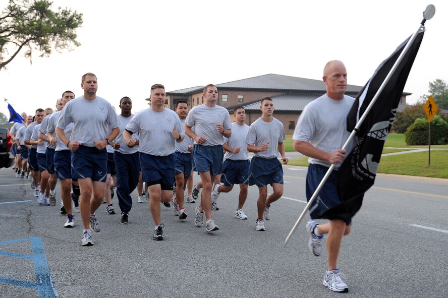 U.S. Air Force Command Chief Master Sgt. Frank Batten, 23rd Wing command chief, leads participants in a Tiger-thon run at Moody Air Force Base, Ga., Sept. 16, 2011. The 23-mile run started on base, continued through the local community and ended at Moody’s Prisoners of War/Missing in Action Memorial Park. (U.S. Air Force photo by Senior Airman Ciara Wymbs/Released)