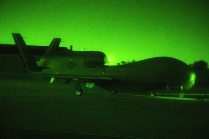 A RQ-4 Global hawk is moved on the flight line on Grand Forks Air Force Base Sept. 19. The Global Hawk covers intelligence collection capability to support forces in worldwide peace, crisis and wartime operations. The capabilities of the aircraft allow more precise targeting of weapons and better protection of forces through superior surveillance capabilities. (U.S. Air Force photo by Senior Airman Amanda N. Stencil)