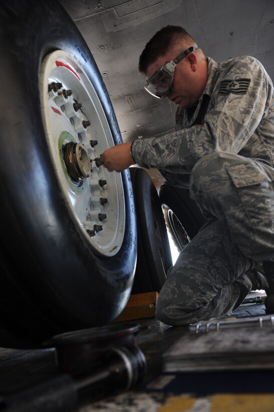 Tech. Sgt. Mark Wight, 28th Aircraft Maintenance Squadron crew chief, replaces safety wire on a B-1B Lancer’s landing gear on Ellsworth Air Force Base, S.D., Sept. 8, 2011. Wight was receiving B-1 specific training to prepare him to compete in the Global Strike Challenge. The event is designed for teams from each bomber and missile wing to develop highly-disciplined Airmen, build esprit de corps, and recognize the best of the best Airmen.  (U.S. Air Force photo by Airman 1st Class Kate Thornton/Released)