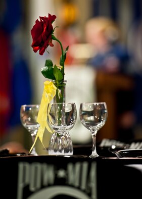 The single red rose is displayed on the POW/MIA table.  The rose is to remind people of the families and loved ones of the comrades in arms, who keep faith awaiting their return.  (U.S. Air Force photo/Samuel King Jr.)