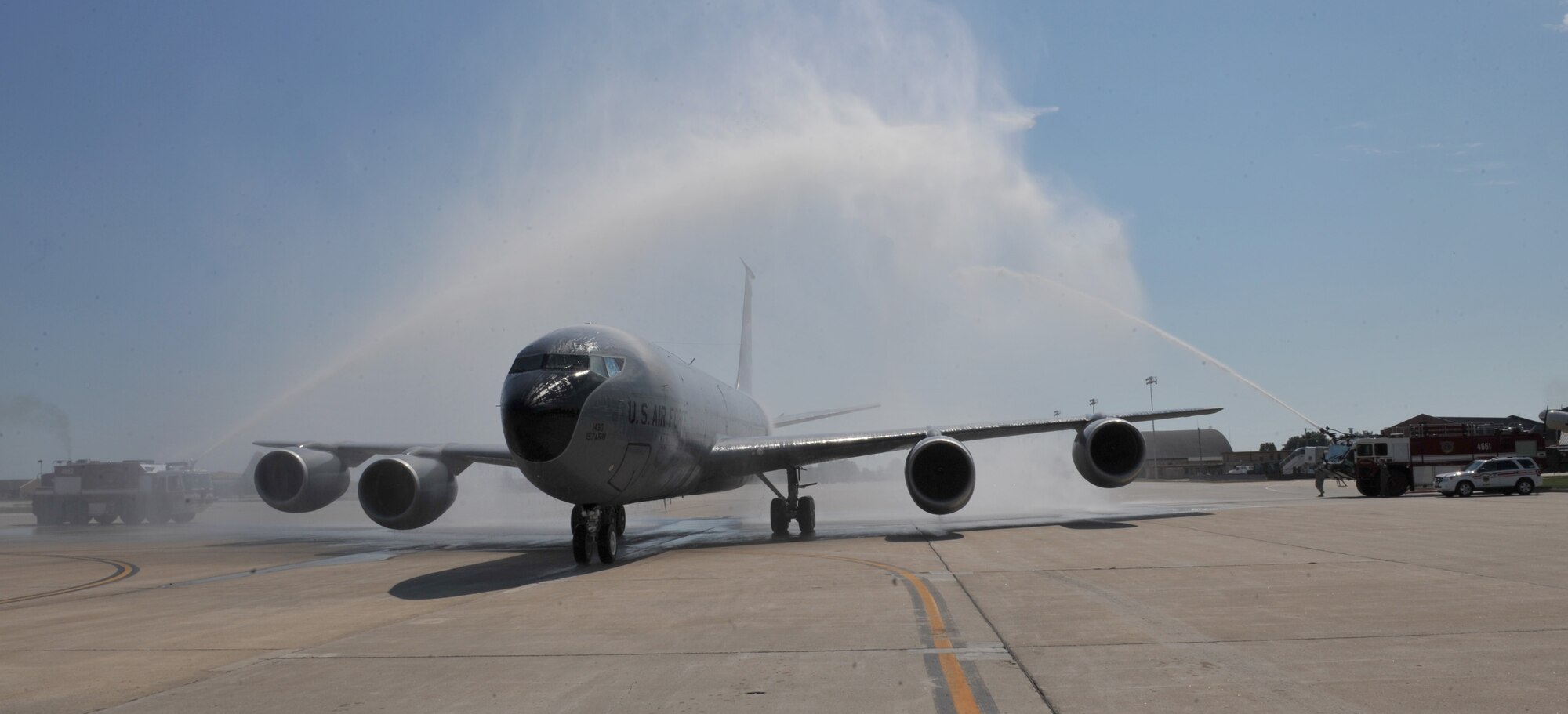 SCOTT AIR FORCE BASE, Ill. - Fire trucks create a water "curtain" over a KC-135 
Stratotanker piloted by Lt. Gen. Robert R. Allardice, 18th Air Force 
Commander, here Sept. 13. The flight took Allardice past the 5,000 flight hour 
milestone and represented one of his last flights as 18th Air Force Commander. 
General Allardice hands over command to Lt. Gen. Mark F. Ramsay Sept. 23 as he 
goes on to his next assignment as Vice Commander of Air Mobility Command. (U.S. Air Force Photo by Airman 1st Class Divine Cox, 375 Air Mobility Wing Public Affairs)

