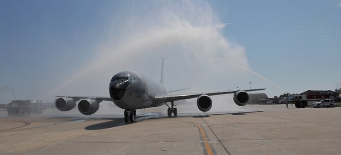 SCOTT AIR FORCE BASE, Ill. - Fire trucks create a water "curtain" over a KC-135 
Stratotanker piloted by Lt. Gen. Robert R. Allardice, 18th Air Force 
Commander, here Sept. 13. The flight took Allardice past the 5,000 flight hour 
milestone and represented one of his last flights as 18th Air Force Commander. 
General Allardice hands over command to Lt. Gen. Mark F. Ramsay Sept. 23 as he 
goes on to his next assignment as Vice Commander of Air Mobility Command. (U.S. Air Force Photo by Airman 1st Class Divine Cox, 375 Air Mobility Wing Public Affairs)

